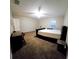 Bedroom with a bed and furnishings with good natural light coming through the windows at 14448 Pleach St, Winter Garden, FL 34787