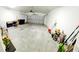 Spacious garage with ample storage and parking space at 14448 Pleach St, Winter Garden, FL 34787