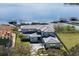 Sprawling waterfront home with lush landscaping, a boat dock and picturesque lake views at 14544 Avenue Of The Rushes, Winter Garden, FL 34787