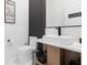 Modern bathroom featuring a floating vanity, minimalist sink and toilet, and stylish decor at 14544 Avenue Of The Rushes, Winter Garden, FL 34787