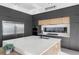 Well-lit kitchen features a large island with quartz countertops, stainless steel appliances, and sleek modern cabinetry at 14544 Avenue Of The Rushes, Winter Garden, FL 34787