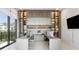 Bright home office featuring built-in shelving, and a spacious work area at 14544 Avenue Of The Rushes, Winter Garden, FL 34787