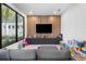 Bright and colorful playroom featuring a large window, built-in storage, and a cozy seating area at 14544 Avenue Of The Rushes, Winter Garden, FL 34787