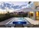 Backyard featuring a spa, pool, patio with lounge chairs, and peaceful views at 14544 Avenue Of The Rushes, Winter Garden, FL 34787