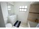 Bathroom with updated vanity, and a tiled shower-tub combination at 14712 Eagles Crossing Dr, Orlando, FL 32837