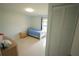 Cozy bedroom with bright natural light, a closet, and neutral colored walls at 14712 Eagles Crossing Dr, Orlando, FL 32837