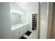 Elegant main bathroom featuring double sinks, modern fixtures, and ample storage at 14712 Eagles Crossing Dr, Orlando, FL 32837