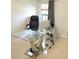 Bright office space with modern glass desk and neutral decor at 14712 Eagles Crossing Dr, Orlando, FL 32837