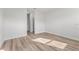 Neutral bedroom showcasing wood-style floors, and white walls at 15354 Sw 43Rd Avenue Rd, Ocala, FL 34473