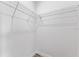 Walk-in closet features wire shelving and bright neutral colored walls at 15354 Sw 43Rd Avenue Rd, Ocala, FL 34473