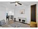 Open area hallway with desk, decorative rug, mounted artwork and nearby staircase at 17052 Cercis Loop, Clermont, FL 34711