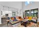 Comfortable living room area seamlessly blends with an open kitchen, perfect for entertaining at 17052 Cercis Loop, Clermont, FL 34711