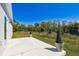 Enjoy this view of the backyard and lush green space from the back patio at 1870 Blackwelder Rd, De Leon Springs, FL 32130