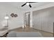 Neutral bedroom featuring a large closet, light wood floors, and an elephant wall decor at 200 Tollgate Trl, Longwood, FL 32750