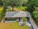 Attractive aerial view of the property showcasing the home's layout, landscaped yard, and convenient carport at 217 Wilmer Ave, Orlando, FL 32811