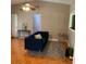 Inviting living room featuring a modern couch and ceiling fan at 217 Wilmer Ave, Orlando, FL 32811