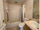 Accessible bathroom with grab bars, tub-shower combo, and vanity, designed for comfort and safety at 235 Tuscany Pointe Ave, Orlando, FL 32807