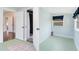 Freshly painted room with a door to the bathroom at 2431 Narcissus Ave, Sanford, FL 32771