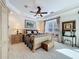 Bright bedroom featuring a window seat and a wooden chest at 254 Sylvan Blvd, Winter Park, FL 32789