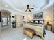 Spacious bedroom with a ceiling fan, bed and a wooden chest at 254 Sylvan Blvd, Winter Park, FL 32789