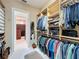 Organized walk-in closet with clothing racks and shelves for storage at 254 Sylvan Blvd, Winter Park, FL 32789