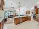 Spacious open concept kitchen featuring an island and modern appliances at 254 Sylvan Blvd, Winter Park, FL 32789