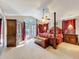 Elegant main bedroom with four-poster bed, wooden furniture, and private access to the outdoor area at 254 Sylvan Blvd, Winter Park, FL 32789