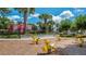 Vibrant community playground with yellow spring riders and a castle-themed play structure, perfect for Gathering fun at 2683 Manesty Ln, Kissimmee, FL 34747