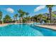 Relaxing pool area features comfortable lounge chairs and shady pergolas, perfect for enjoying sunny days with friends and Gathering at 2683 Manesty Ln, Kissimmee, FL 34747
