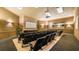 Private theater room features comfortable seating and a large screen for immersive movie experiences with Gathering and friends at 2683 Manesty Ln, Kissimmee, FL 34747
