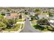 Aerial view of the Bridgewater community, showcasing well-manicured lawns, sidewalks, and mature trees at 3084 Stillwater Dr, Kissimmee, FL 34743