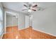 Bedroom featuring tile floors, a mirrored closet, and neutral-toned walls at 3084 Stillwater Dr, Kissimmee, FL 34743