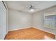 A cozy bedroom with tile floors and a window offering natural light at 3084 Stillwater Dr, Kissimmee, FL 34743