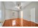 Bright bedroom featuring tile flooring, vaulted ceilings, and a modern ceiling fan at 3084 Stillwater Dr, Kissimmee, FL 34743