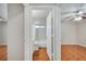 Hallway featuring view to a bedroom and a bathroom at 3084 Stillwater Dr, Kissimmee, FL 34743