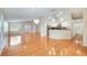 Open concept living area with tile floors, a chandelier, and seamless access to the kitchen at 3084 Stillwater Dr, Kissimmee, FL 34743