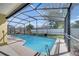 Relaxing screened-in pool area perfect for outdoor enjoyment and entertaining guests at 3084 Stillwater Dr, Kissimmee, FL 34743