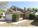 Charming two-story home with attached garage and well-manicured landscaping at 3623 S Saint Lucie Dr, Casselberry, FL 32707