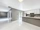 An updated kitchen with modern appliances and stylish granite countertops at 5401 Elm Ct # 303, Orlando, FL 32811
