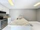 Bright kitchen with granite countertops, stainless steel appliances, and a stainless steel sink at 5401 Elm Ct # 303, Orlando, FL 32811