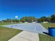 Outdoor basketball court on a sunny day in a well-maintained community at 548 Big Sioux Ct, Kissimmee, FL 34759