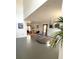 Spacious living room with soaring ceilings and large windows for ample natural light at 548 Big Sioux Ct, Kissimmee, FL 34759