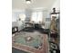 Bright office space featuring dual workstations and a large ornate area rug at 548 Big Sioux Ct, Kissimmee, FL 34759