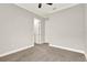 Neutral bedroom with soft carpet, crown molding and white doors at 5499 Orange Orchard Dr, Winter Garden, FL 34787