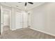 Spacious bedroom featuring plush carpet flooring, large closets, and ample natural light at 5499 Orange Orchard Dr, Winter Garden, FL 34787