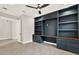 Office with custom shelving, wood countertops, drawers and tile floors at 5499 Orange Orchard Dr, Winter Garden, FL 34787