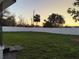 Large backyard with a white privacy fence and well-maintained grass at 636 Coke Ave, Winter Garden, FL 34787