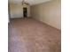A large living room featuring neutral carpeting, providing a versatile living space at 725 Northlake Blvd # 66, Altamonte Springs, FL 32701