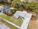 Aerial view of manicured front lawn and driveway at 7549 Dockside St, Winter Park, FL 32792