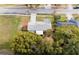 Birds eye view of house with trees surrounding at 7549 Dockside St, Winter Park, FL 32792
